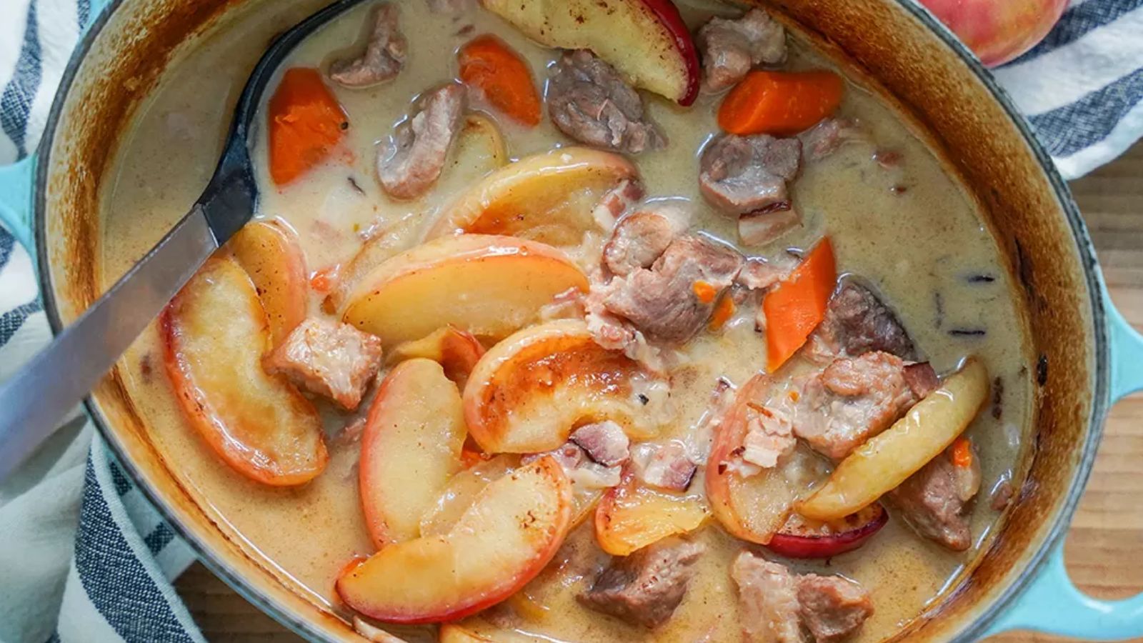 Pork and cider casserole with apple