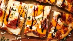 Peach Pizza with Goat Cheese, Prosciutto, and Honey