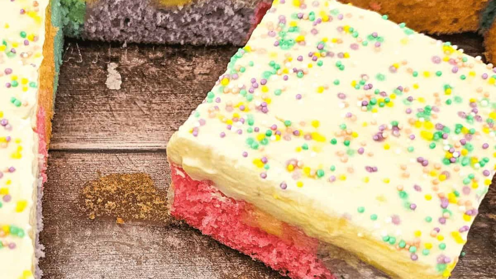 Rainbow Pudding Poke Cake