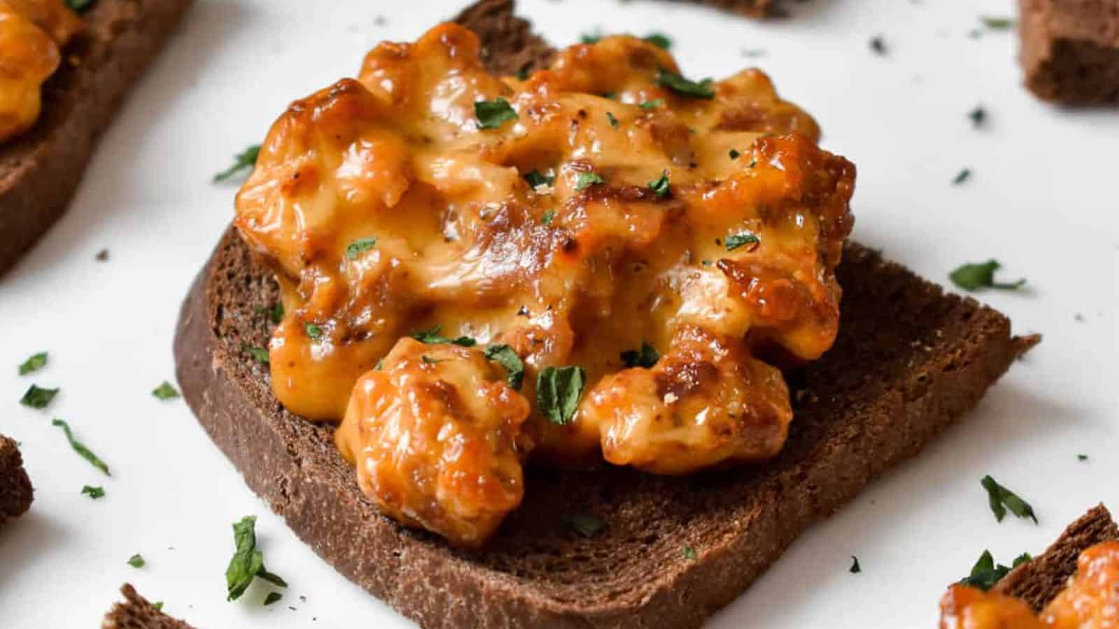Pumpernickel Sausage Cheese Toasts