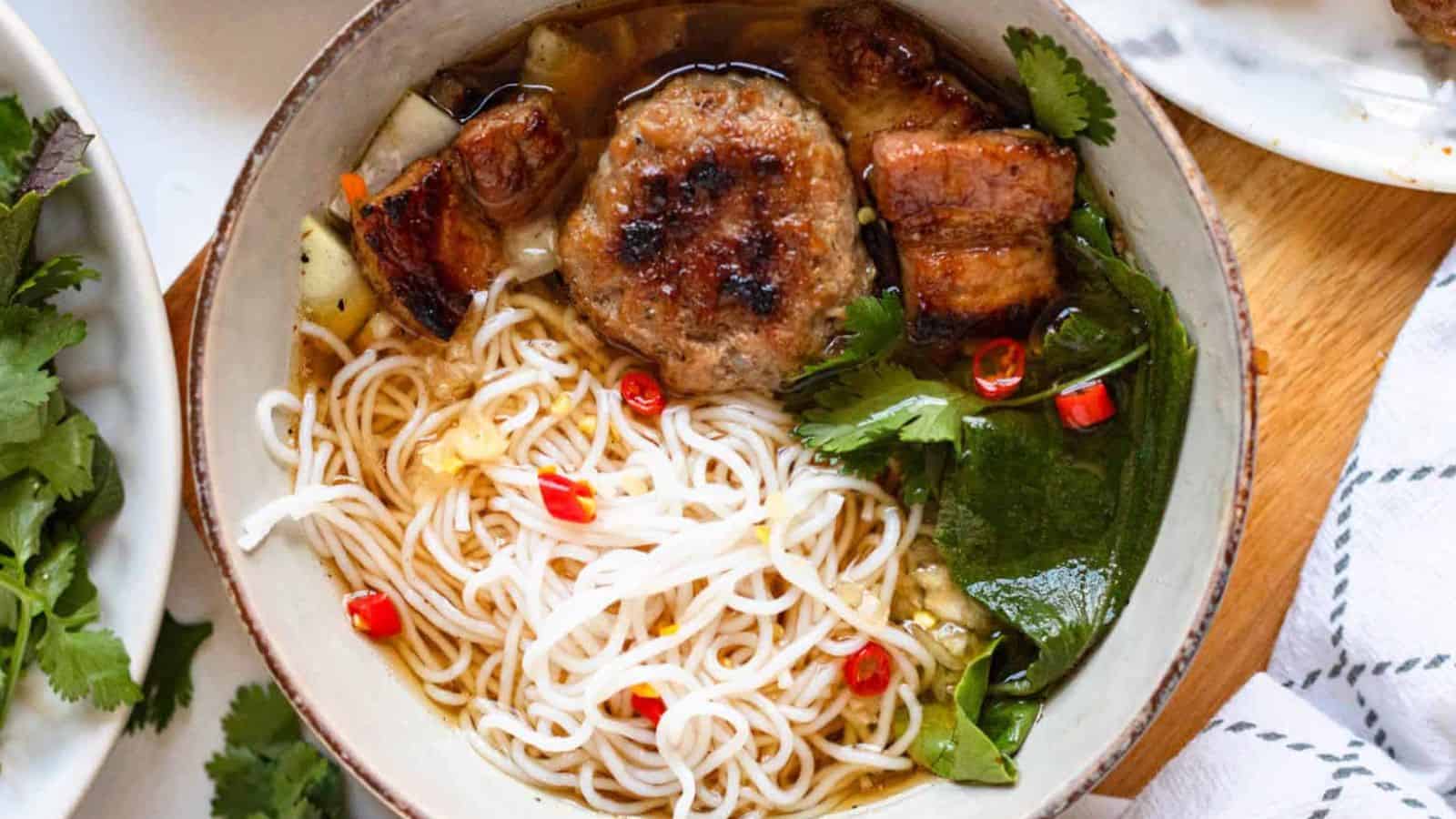 Bรบn Chแบฃ Hanoi with Caramelized Meatballs and Herbs