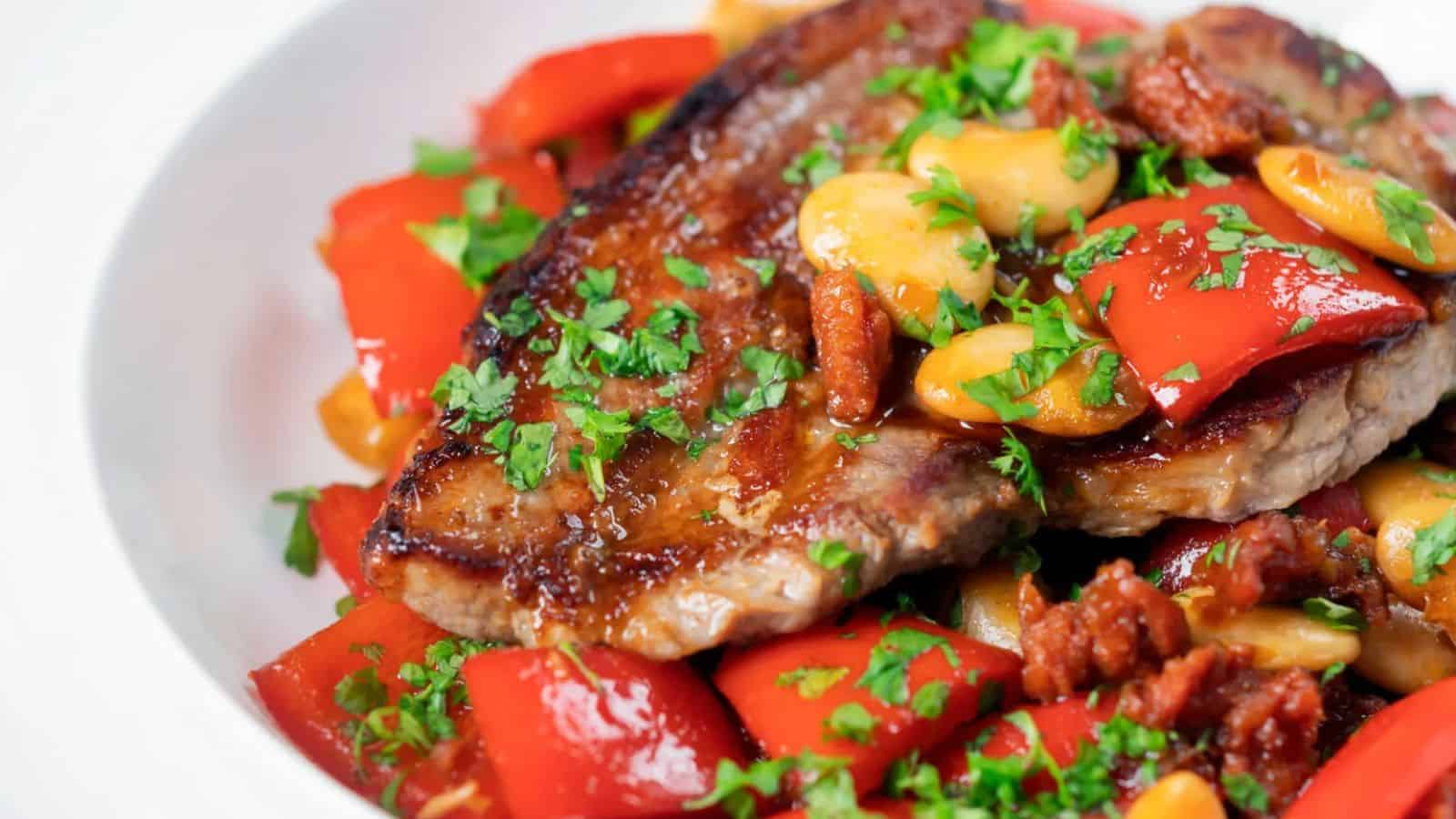 Oven Roast Pork Loin Steaks with Chorizo, Peppers and Beans